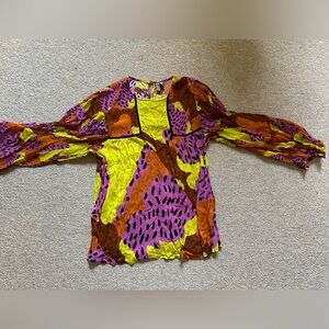 Beautiful and vibrant shirt from Anthropologie. Great for summer, fall & spring